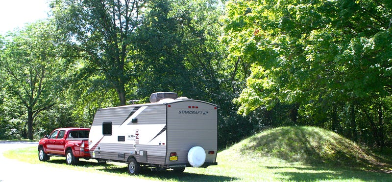 Author's travel rig next to a mound