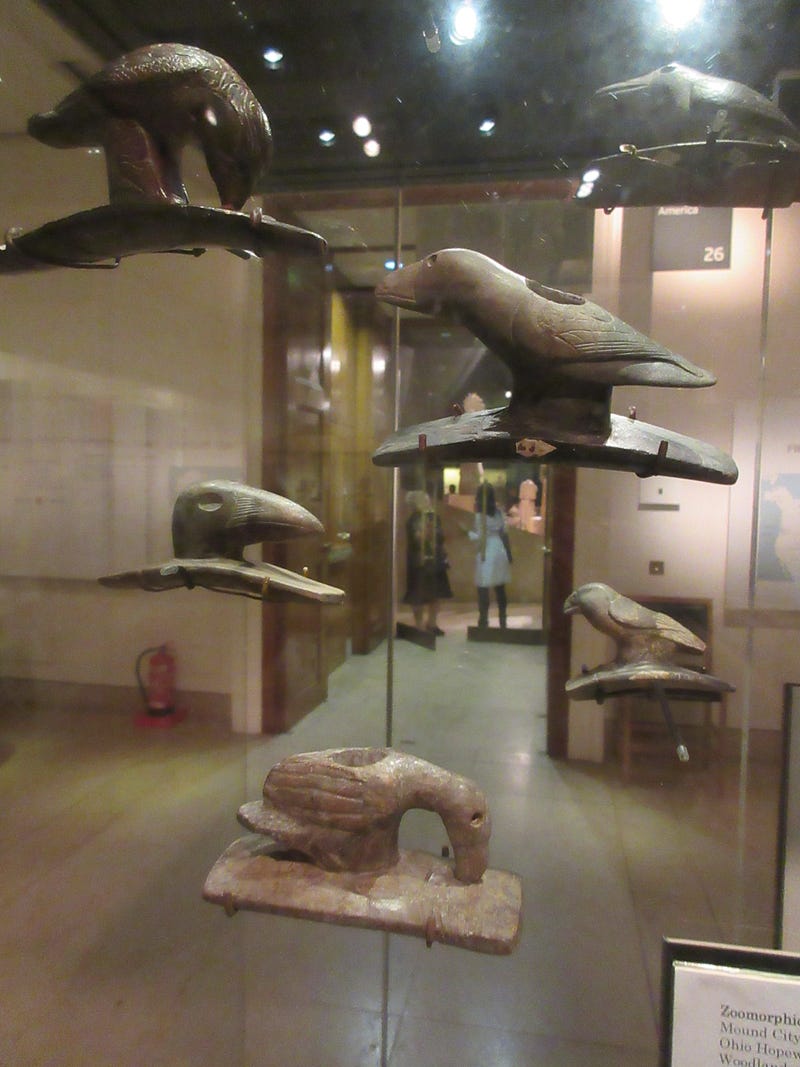 Effigy pipes displayed in a museum